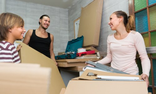 Moving team preparing boxes and furniture for a Maidavale relocation