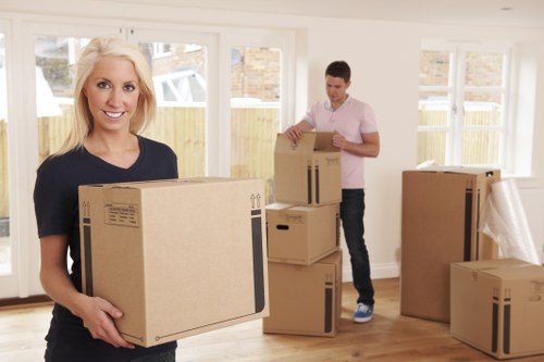 Trained moving staff handling furniture carefully during a relocation