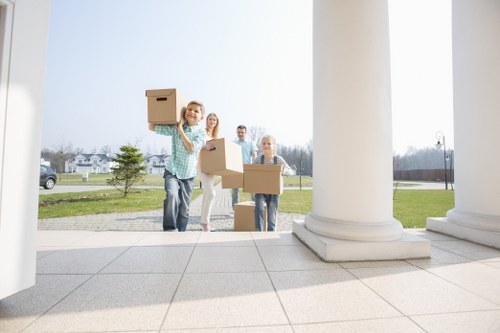 Team using careful handling techniques during a move