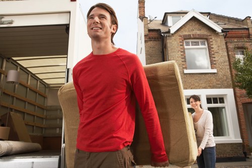 Packed moving boxes ready for house removals in Maidavale