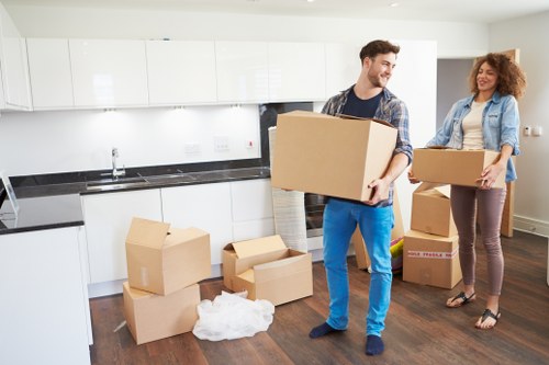 Moving and storage boxes arranged for home relocation in Maidavale