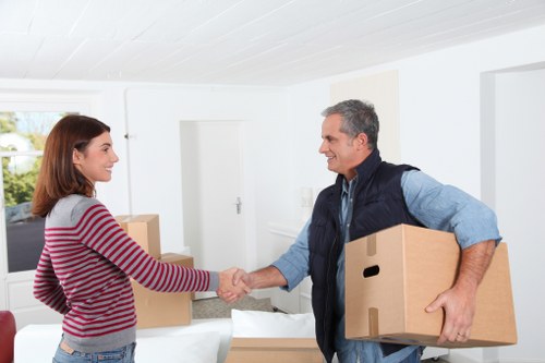 Movers protecting special items during relocation