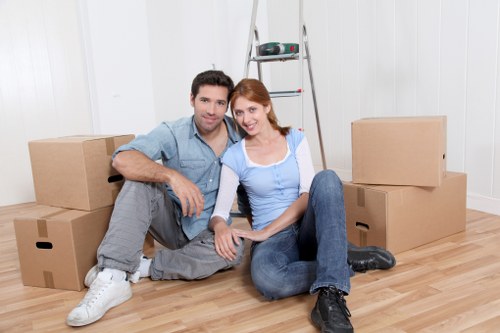 Packed moving boxes ready for transport in a Maida Vale property