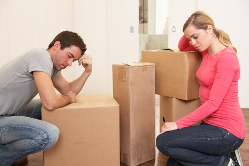 Professionals loading bulky furniture during a Maidavale pickup