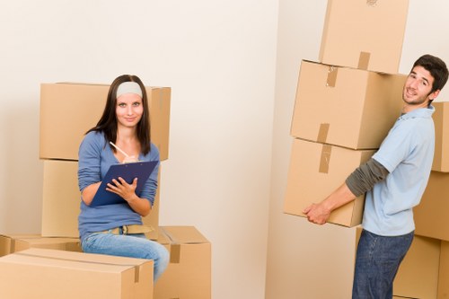 Professional movers handling furniture in a residential move