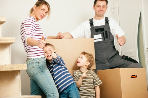 Loading household items into a van near Maida Vale